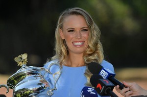 caroline-wozniacki-poses-with-her-trophy-in-melbourne-9.jpg