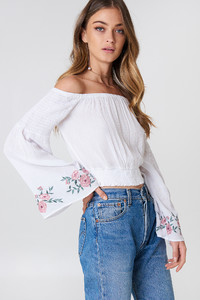 debi_flue_embroidered_smocked_off_shoulder_top_1552-000014-0001_01a.jpg