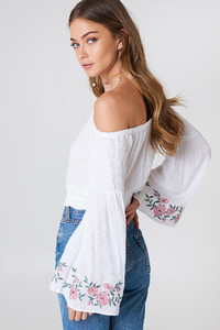 debi_flue_embroidered_smocked_off_shoulder_top_1552-000014-0001_02n.jpg