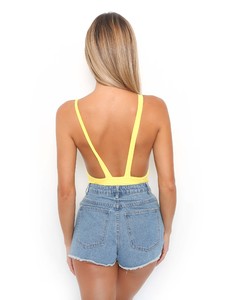 fd754a09fe6b3f9e0bea852804d7fe6e_saffron-bodysuit-yellow_28397868-0168-42e1-9e72-d3d5ad3904ee_4000x4000.jpg