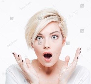 stock-photo-amazed-blonde-woman-looking-at-camera-isolated-on-a-white-background-394075756.jpg