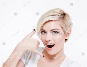 stock-photo-pretty-woman-showing-a-call-me-gesture-isolated-on-a-white-background-394072147.jpg