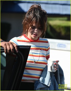 selena-gomez-grabs-breakfast-at-ihop-leaves-with-coffee-mug-16.jpg