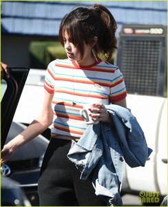 selena-gomez-grabs-breakfast-at-ihop-leaves-with-coffee-mug-18.jpg