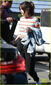 selena-gomez-grabs-breakfast-at-ihop-leaves-with-coffee-mug-21.jpg