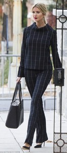 468BBD8B00000578-5468223-Repeat_Ivanka_appears_to_be_quite_fond_of_the_checked_outfit_She-m-43_1520347068885.jpg