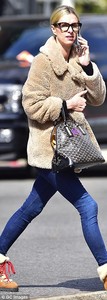 49EF43B600000578-5470385-So_fancy_The_Hilton_heiress_carried_a_monogrammed_Goyard_St_Loui-a-327_1520379474236.jpg
