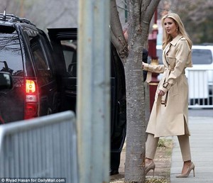 4AAB657C00000578-5559283-On_her_way_out_Ivanka_failed_to_raise_a_smile_as_she_headed_to_t-a-4_1522342316108.jpg