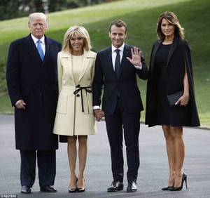 4B78F28600000578-5651835-Center_of_attention_Brigitte_and_Macron_held_hands_as_they_stood-a-115_1524589452171.jpg