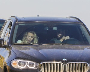 miley-cyrus-and-liam-hemsworth-driving-in-malibu-04-22-2018-0.jpg