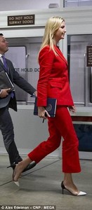 4D2AFA5900000578-5840091-Working_girl_Ivanka_looked_chic_in_a_red_suit_and_black_and_whit-a-63_1528911141133.jpg