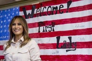 4D7F11A800000578-5870891-Extraordinary_visit_The_First_Lady_signed_an_American_flag_greet-a-78_1529616087948.jpg