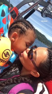 4DF6ABA800000578-5926639-Mom_s_love_She_kissed_her_son_Saint_while_on_the_boat-a-101_1530900745142.jpg
