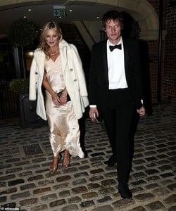 5007028-6271119-Happy_couple_Despite_the_long_day_the_pair_looked_delighted_to_b-a-90_1539382487356.jpg