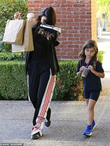 5079012-6280173-Mom_duty_Kourtney_Kardashian_was_spotted_spending_time_with_daug-a-24_1539660708556.jpg