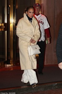 5387852-6314349-Game_on_Jennifer_Lopez_headed_to_Fenway_Park_o_watch_game_two_of-a-100_1540449784317.jpg