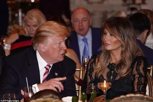 6539586-6418999-President_Trump_and_Melania_Trump_enjoy_Thanksgiving_dinner_at_M-a-1_1542983294961.thumb.jpg.50df7b85b665f229c2ee27809d637f5c.jpg