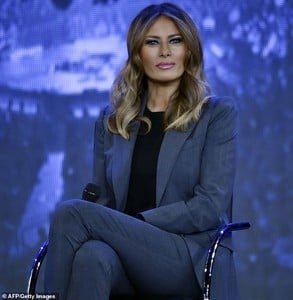 6754366-6438767-Melania_Trump_defended_her_controversial_red_Christmas_trees_at_-m-1_1543426159622.jpg
