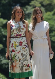 6849178-6450175-Melania_looked_in_high_spirits_as_she_was_welcomed_by_Argentinia-a-15_1543698630389.thumb.jpg.a965566cc6b5c7af31e78e37a5bbe878.jpg
