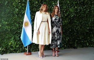 6882876-6450175-Argentina_s_first_lady_Juliana_Awada_right_welcomes_U_S_first_la-a-25_1543686573466.jpg