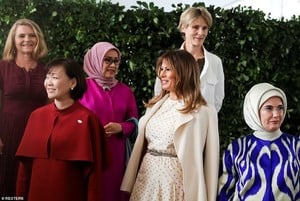 6883808-6450175-US_First_lady_Melania_Trump_front_centre_Japanese_Prime_Minister-a-23_1543686568804.jpg