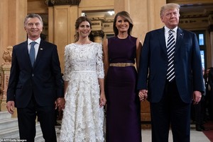 6888110-6450175-The_Trumps_beamed_as_they_attended_the_opera_gala_with_Argentina-a-18_1543698641133.jpg