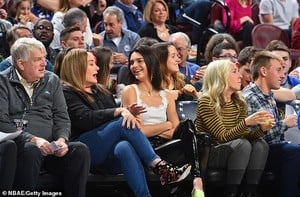 6928392-6453605-Julie_and_Kendall_Then_on_Friday_Jenner_was_seated_at_the_76ers_-a-4_1543813682436.jpg