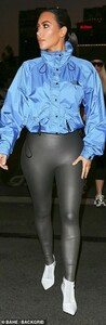7369674-6491149-Groomed_Her_raven_locks_were_styled_into_a_high_slicked_back_pon-a-5_1544695521527.jpg