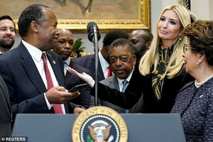 7396998-6492787-Fun_on_the_job_Ivanka_shared_a_laugh_with_Secretary_of_Housing_a-a-6_1544734625626.jpg
