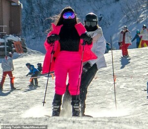 7941076-6538935-Ski_bunny_Kim_rocked_a_bold_and_pricy_neon_pink_Prada_ski_suit-a-1_1546129309587.jpg