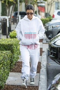 kourtney-kardashian-in-grey-sweatsuit-hoodie-black-high-top-sneakers-and-dark-sunglasses-12-02-2018-4.jpg
