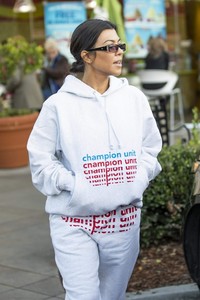 kourtney-kardashian-in-grey-sweatsuit-hoodie-black-high-top-sneakers-and-dark-sunglasses-12-02-2018-5.jpg