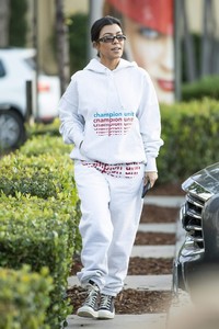 kourtney-kardashian-in-grey-sweatsuit-hoodie-black-high-top-sneakers-and-dark-sunglasses-12-02-2018-8.jpg