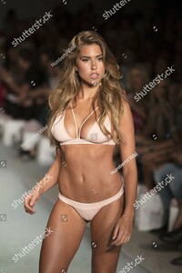 stock-photo-model-kara-del-toro-walks-the-runway-for-beach-bunny-summer-collection-during-funkshion-682275730.jpg