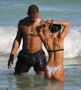 8065262-6549659-Fun_in_the_sun_Karrueche_has_been_dating_the_athlete_for_about_a-m-152_1546468429465.jpg