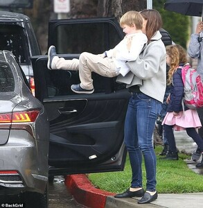 8628264-6601053-Samuel_seemed_to_enjoy_the_ride_as_his_mom_lifted_him-m-35_1547690379844.jpg