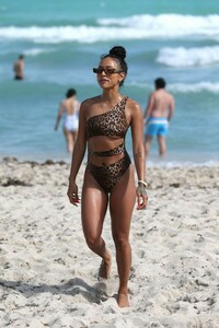 Karrueche-Tran-in-Animal-Print-Swimsuit-2018--18-670x1005.jpg