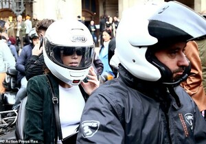 10559540-6769441-VIP_service_Kaia_ws_seen_jumping_on_the_back_of_a_bike_after_wal-a-5_1551718406591.jpg