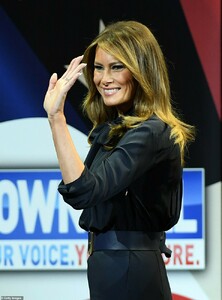 10622732-6774019-Smiling_Melania_Trump_appeared_happy_to_be_taking_part_in_the_op-a-41_1551828194716.jpg