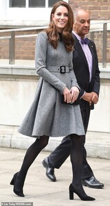11184176-6826333-The_Duchess_of_Cambridge_wore_the_same_Catherine_Walker_coat_and-a-188_1553011495572.jpg