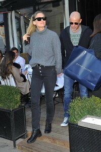 bar-refaeli-and-husband-adi-ezra-are-all-smiles-as-they-leave-lavenue-restaurant-in-paris-france-250219_2.jpg