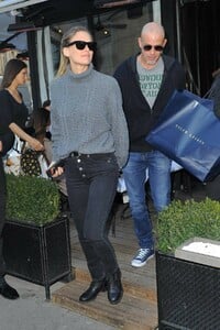bar-refaeli-and-husband-adi-ezra-are-all-smiles-as-they-leave-lavenue-restaurant-in-paris-france-250219_3.jpg