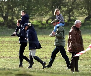 12237930-6919479-Mia_Tindall_was_hoisted_aloft_by_her_mum_s_cousin_Prince_William-a-14_1555200253168.jpg
