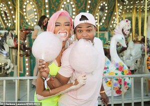 12251262-6920483-So_sweet_Winnie_was_clearly_having_a_ball_at_the_event_as_she_ro-a-2_1555238629202.jpg