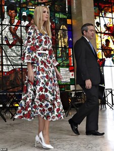 12305392-6924471-Gorgeous_The_floral_dress_was_a_change_from_the_outfit_Ivanka_wo-m-84_1555353261673.jpg