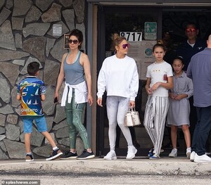 12493706-6940887-The_group_were_spotted_at_an_animal_adoption_center_hinting_that-m-128_1555706589459.jpg