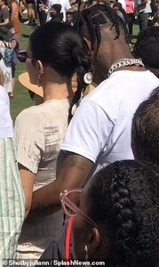 12547368-6945205-Affectionate_The_Astroworld_hitmaker_wrapped_his_arms_around_his-a-20_1555919043844.jpg