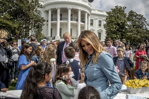 12578536-6947099-The_first_couple_greet_the_children_upon_their_arrival-a-79_1555955035504.jpg