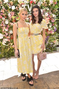 12741334-6961479-Twinning_Caroline_and_Sonia_wore_matching_floral_dresses_from_th-a-56_1556267116011.jpg