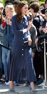 13485098-7027729-Kate_37_re_wore_the_1_750_frock_she_sported_in_Prince_Charles_of-a-49_1557841758770.jpg